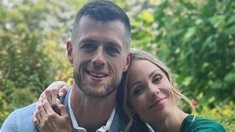 Smallville star Laura Vandervoort is engaged to beau Adam Coates